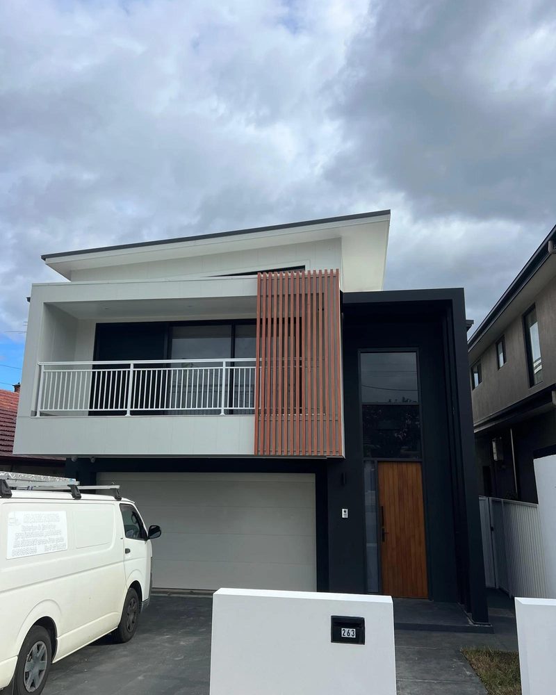 Contemporary two-storey home with fresh white and charcoal paintwork